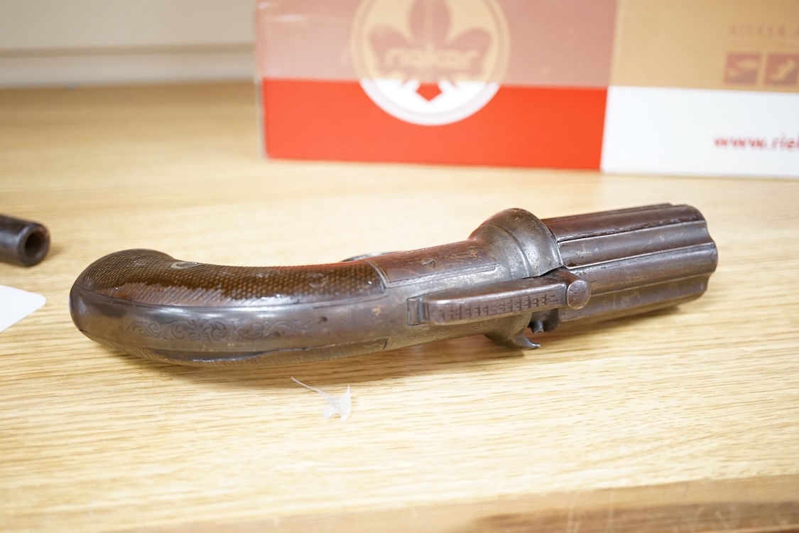 A six shot 120 bore self-cocking percussion pepperbox revolver with fluted barrels, Birmingham proof, rounded foliate engraved frame, and two-piece chequered walnut grips